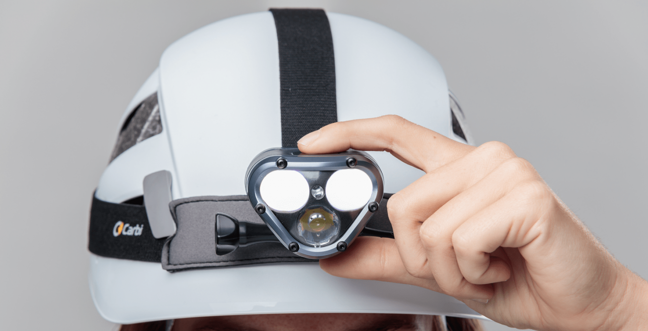 Finished rugged headlamp product on a helmet